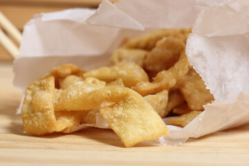 Chinese Food on Wooden Table, Closeup on Fried Noodles