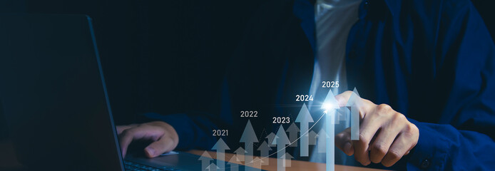 Businessman analyzes sales data and financial reports business growth graph Digital marketing...