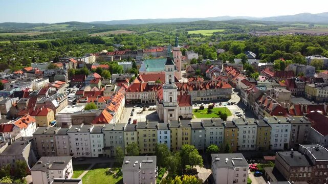 Aerial view of Prudnik, a historical town in southern Poland, town hall and surrounding historic buildings with red-tiled roofs