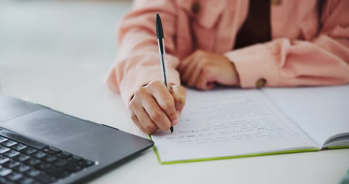 Person, hands and writing for study, university and school quiz in house with book. Student, closeup and memory notes on paper with learning or knowledge for college, scholarship in home bedroom