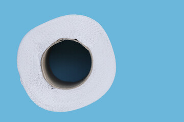 Toilet paper on blue background.