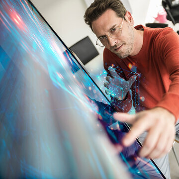 Scientist using AI technology to analyze human brain in laboratory