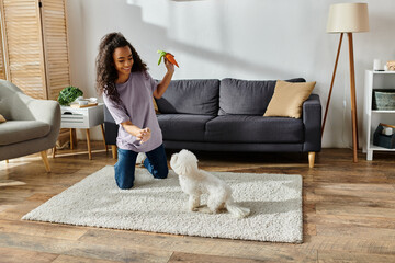Woman joyfully playing with her white Bichon Frise in a cozy living room.