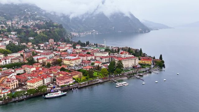 Aerial view of Menaggio an Italian town on Lake Como, on a cloudy day. Architecture and nature for enjoy a vacation in Italy