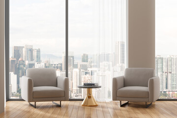 Modern home living room interior with armchairs and coffee table, window