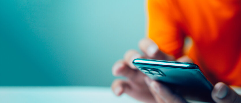 Man sitting and working on computer, Website page, contact us or email marketing concept, customer support hotline, contact us. Email, phone, address, chat message icon.