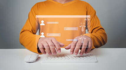 Man wearing an orange shirt chatting with a smart AI using an artificial intelligence chatbot...