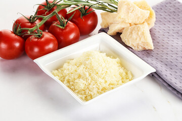 Shredded Italian hard parmesan cheese