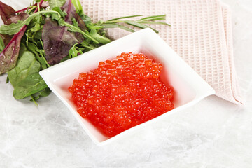 Red caviar in the bowl