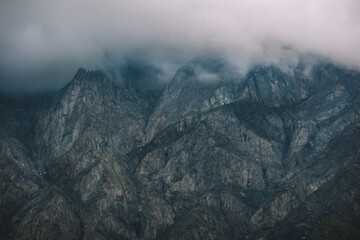 Foggy And Rocky Mountains