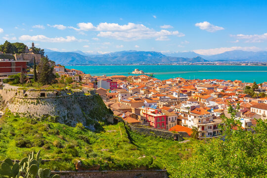 Nafplio or Nafplion, Greece, Peloponnese old town houses aerial panorama and snow mountains
