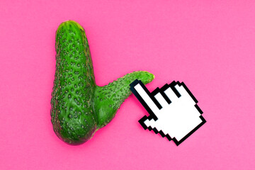 Cucumber with Phallic Growth in Erection State and Pixelated Hand Pointer on Pink Background