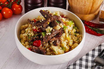 Traditional couscous with beef and vegetables