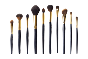 Collection of professional makeup brushes with black handles and gold accents, isolated on a white background. Perfect for beauty enthusiasts.