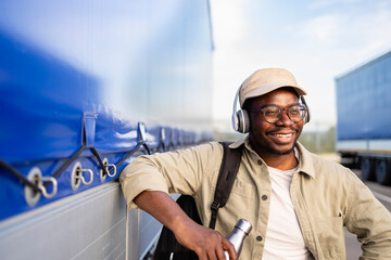 Portrait of happy truck driver ready to deliver goods.