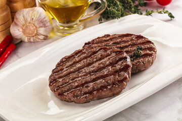 Grilled beef cutlet for burger