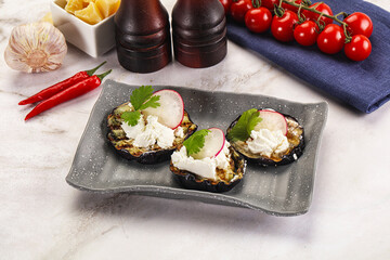 Grilled eggplant with cheese and radish