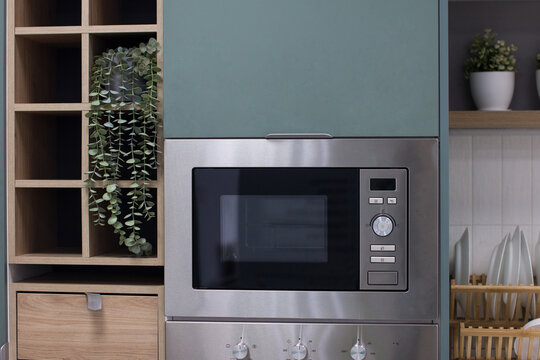 an empty marble countertop with kitchen shelves. Homemade kunya