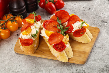 Bruschetta tapas with chorizo and tomato