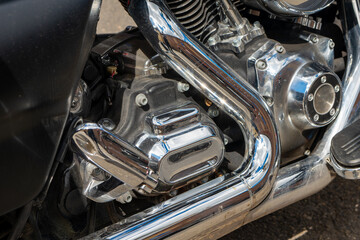 motorcycle engine is shown with a chrome finish
