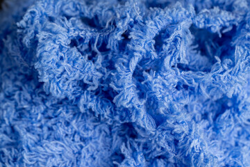 new soft blue threads with traces of other threads close-up