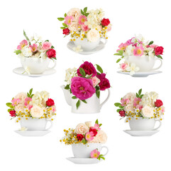 Delicious herbal tea in dishware and beautiful flowers on white background, set
