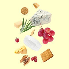 Different types of cheese, crackers, grapes, rosemary and walnut in air on beige background