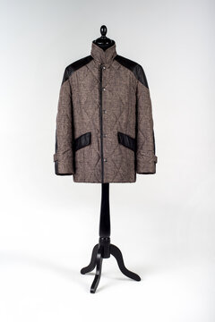 Women's and men's clothing on a mannequin