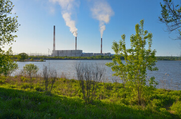 Luchegorskaya GRES power plant scenic view from Luchegorsk reservoir (Primorsky krai, Russia)