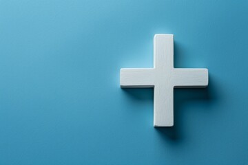 Obraz premium White Cross on Blue Background