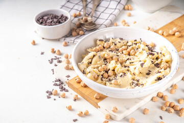 Bowl with vegan Chickpea raw Cookie dough, sweet alternative vegetarian dessert made from Chickpea...
