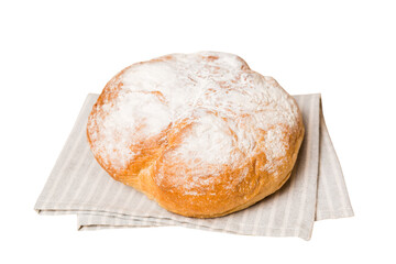 Freshly baked delicious french bread with napkin isolated on white background top view. Healthy white bread loaf