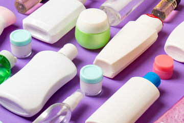 Group of plastic bodycare bottle Flat lay composition with cosmetic products on colored background empty space for you design. Set of White Cosmetic containers, top view with copy space