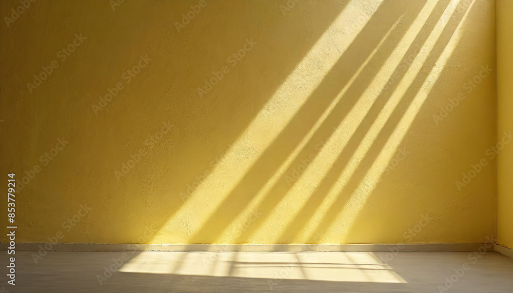 Poster light background of yellow empty wall with shadows, highlights and sun rays, summer spring backgroun