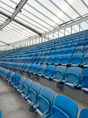 Naklejka premium empty blue tribunes? seating rows in a stadium