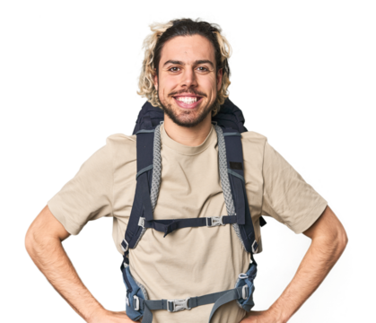 Young Caucasian hiker with backpack confident keeping hands on hips.