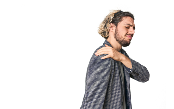 Young businessman in casual blazer having a shoulder pain.