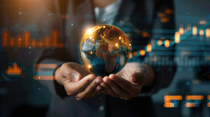 Fototapeta premium Close-up of business woman hand holding shining earth globe market symbolizing innovation and sustainability business communication internet strategy with charts and graphs projected on background 