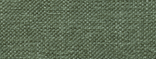 Texture of dark green background from soft textile material. Abstract backdrop from olive fabric, macro