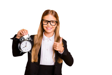 Portrait of stylish beautiful trendy little kid hold hand clock advice no overtime late morning ...