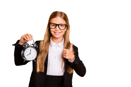 Portrait of stylish beautiful trendy little kid hold hand clock advice no overtime late morning  have eyewear eyeglasses jacket isolated over yellow background