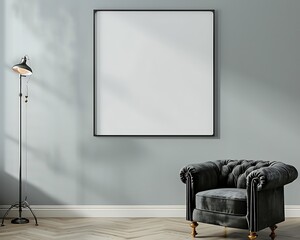 Single square frame on a light gray wall in a living room with a dark gray velvet armchair and a metal floor lamp.