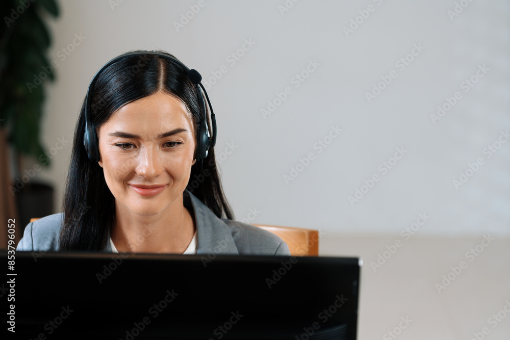 Aufkleber female call center operator or customer service helpdesk staff working on workspace while talking on