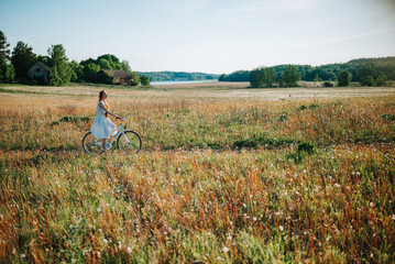 woman cycling in the field