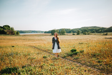 person walking in the field