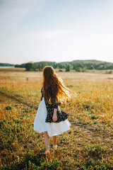 woman walking on the road