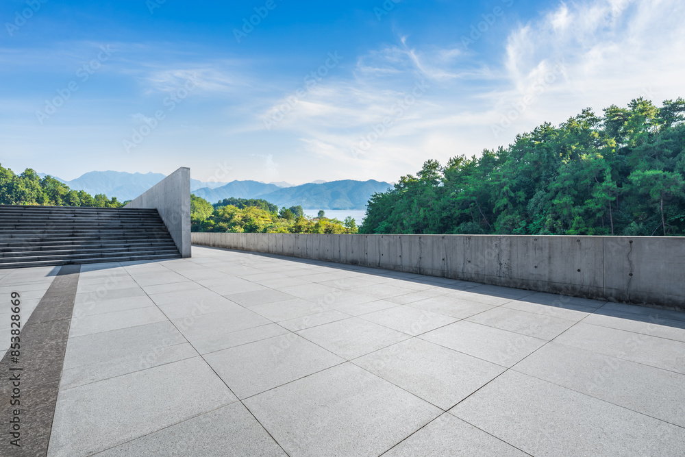 Wall mural empty square floor and green forest with mountain natural landscape under blue sky