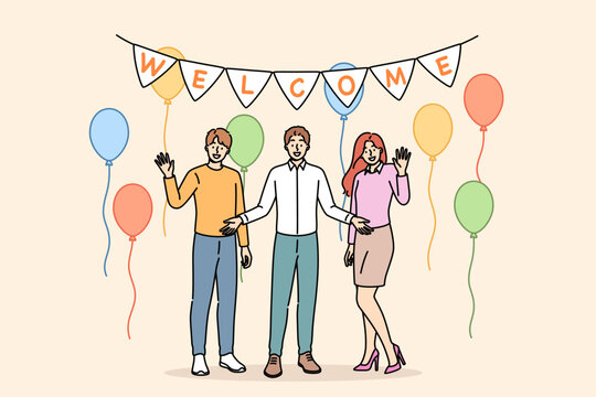 Welcome party from happy family welcoming friends into new apartment with balloons to celebrate move. Welcome party for employee who got job at company and became member of business team