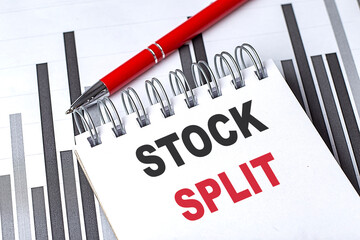 STOCK SPLIT text on notebook on chart with pen