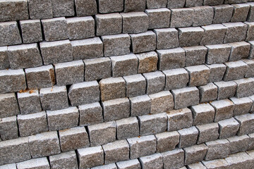 Paving slabs stacked in a row, closeup of photo